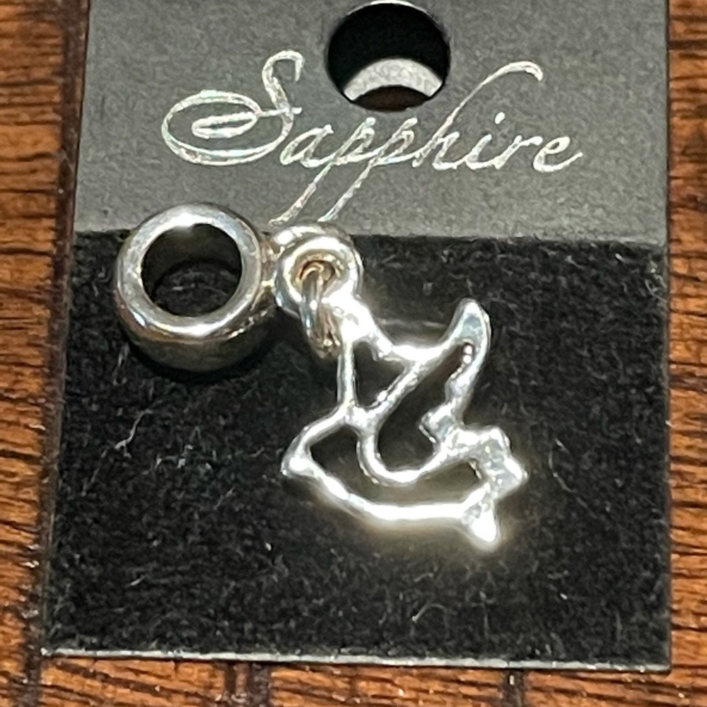 Stainless Steel Dove w wedding band.